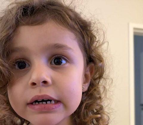 A girl with curly hair — original photo